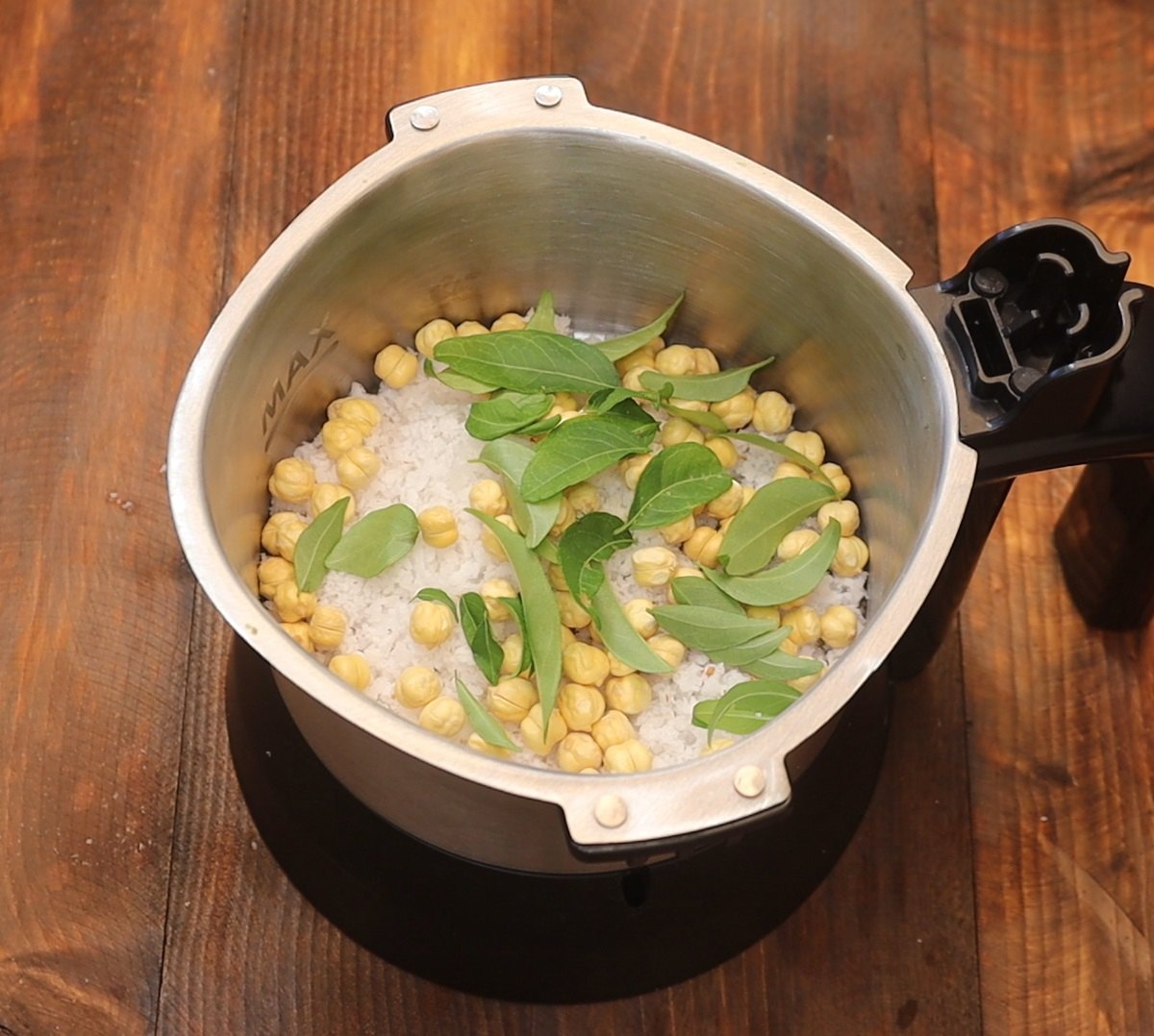 Add Coconut, roasted channa dal, curry leaves
