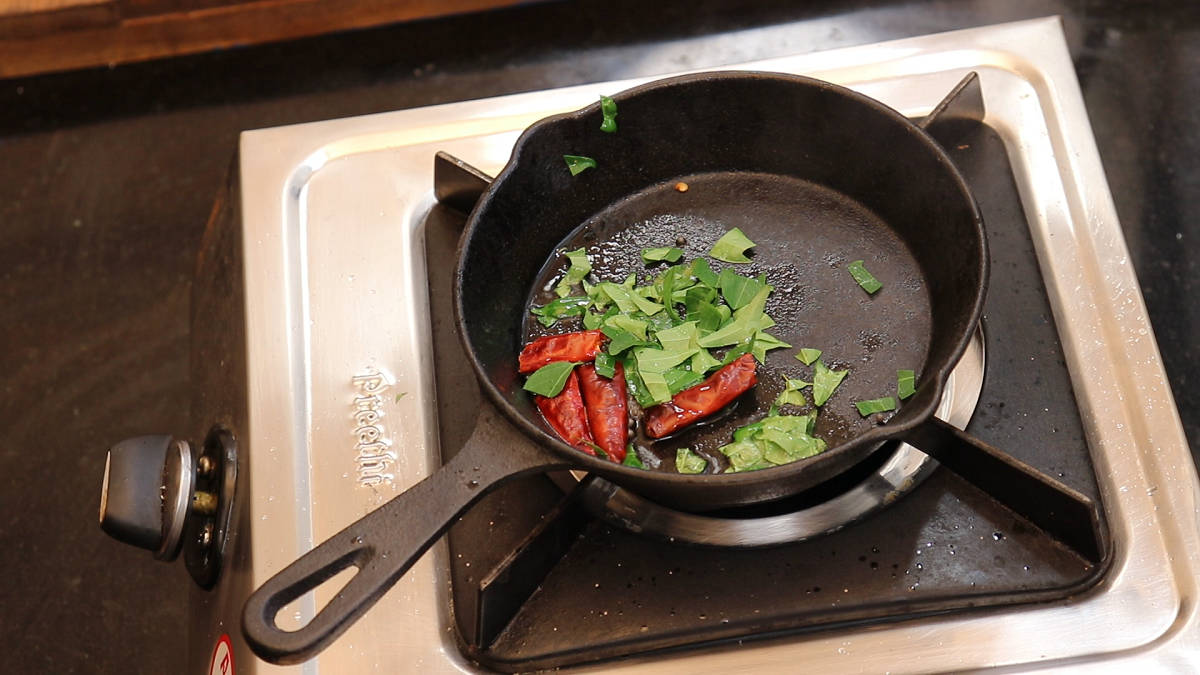 add in curry leaves to the tampering