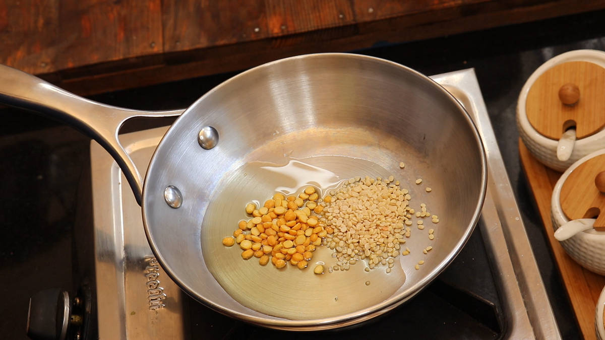 Add Channa Dal and Urad Dal