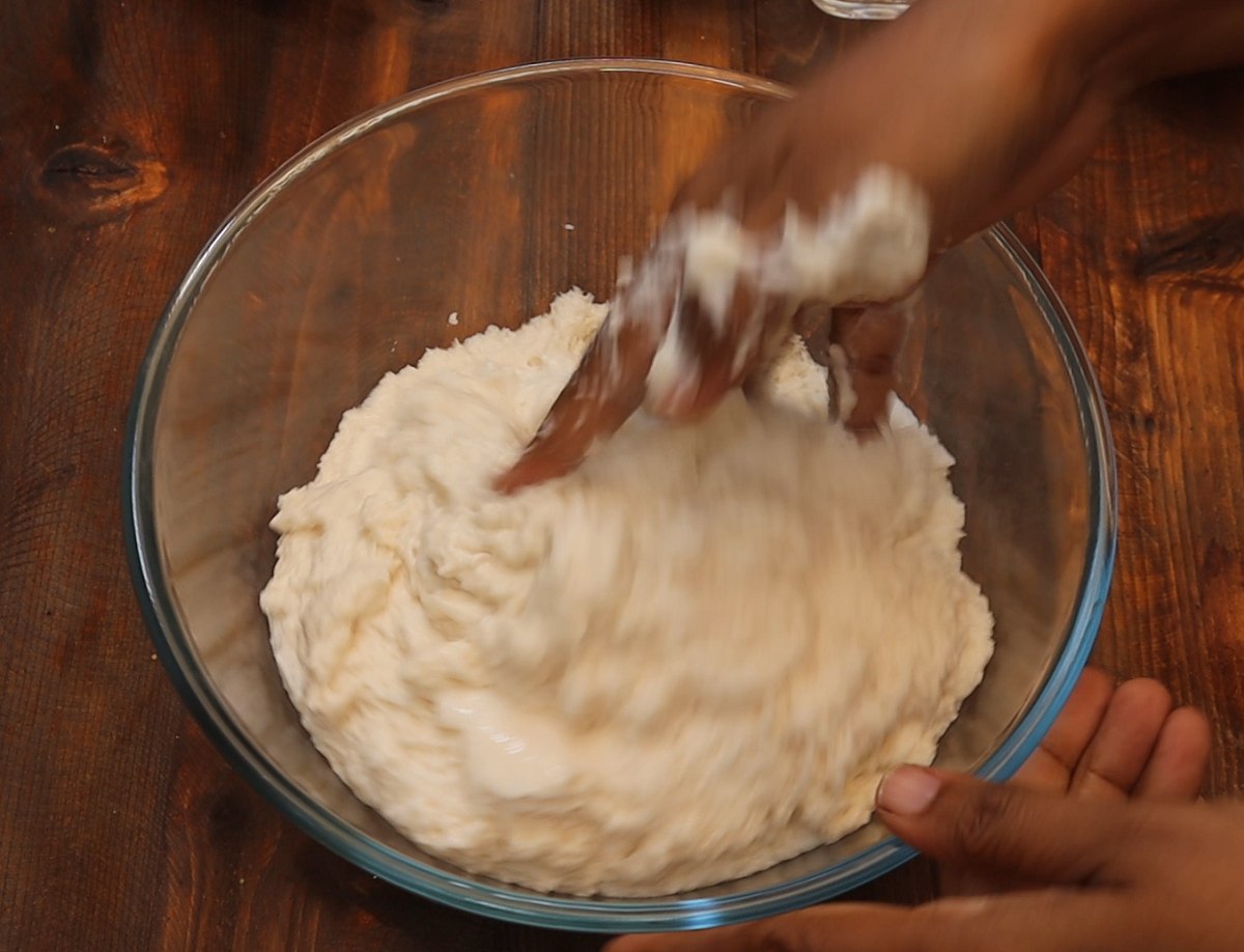 Beat the Urad dal batter in order to make it fluffy